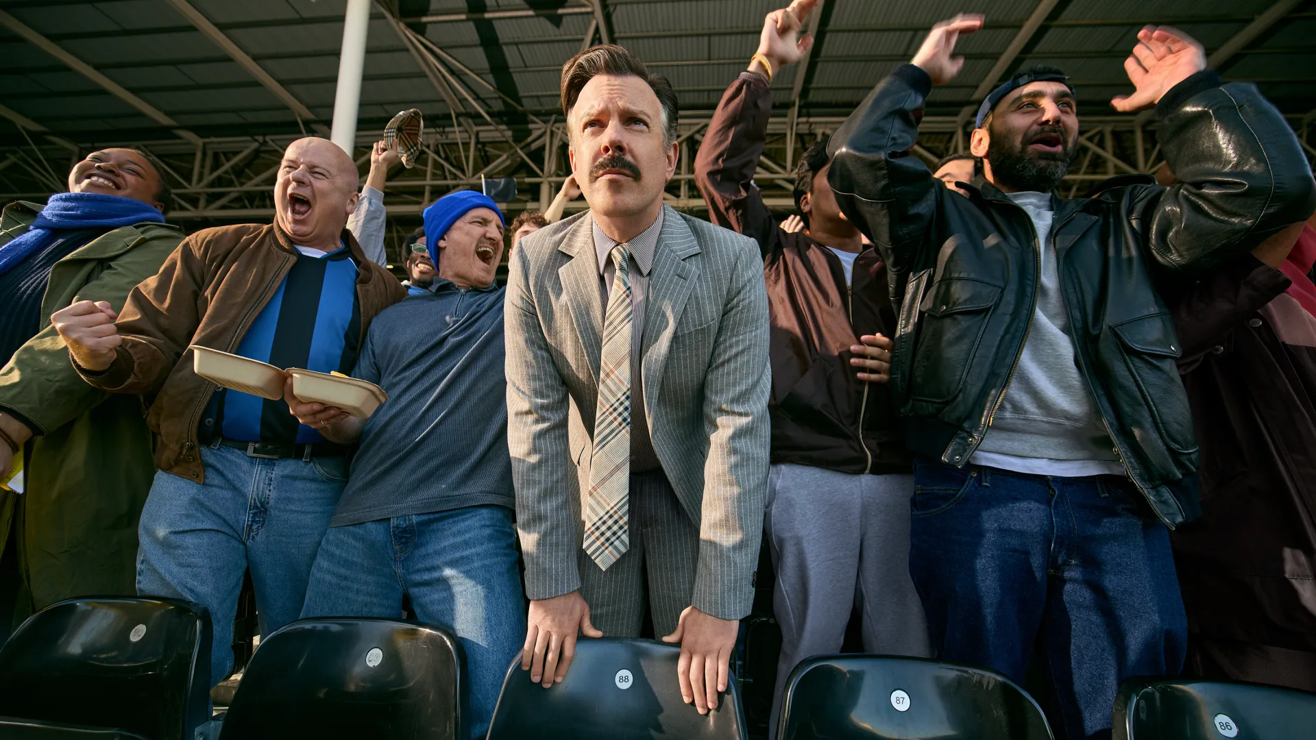 Supporters in the stands in Burberry’s football campaign